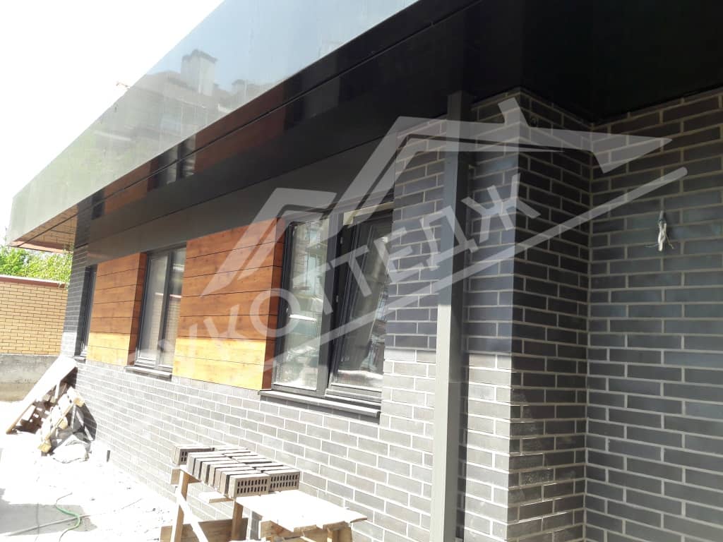 Одноэтажный дом с плоской крышей в Раменском - фасад